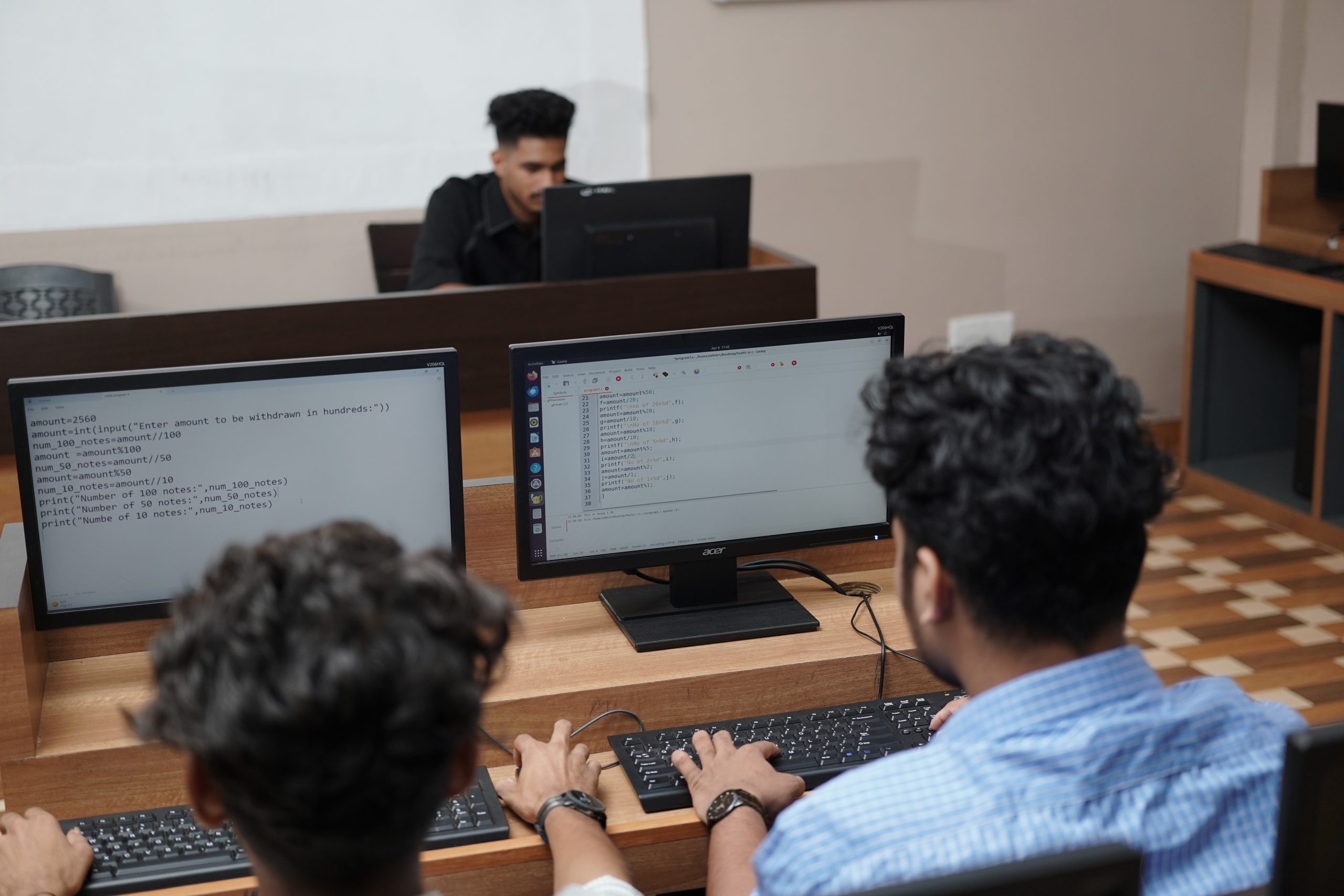 Students programming in the computer lab